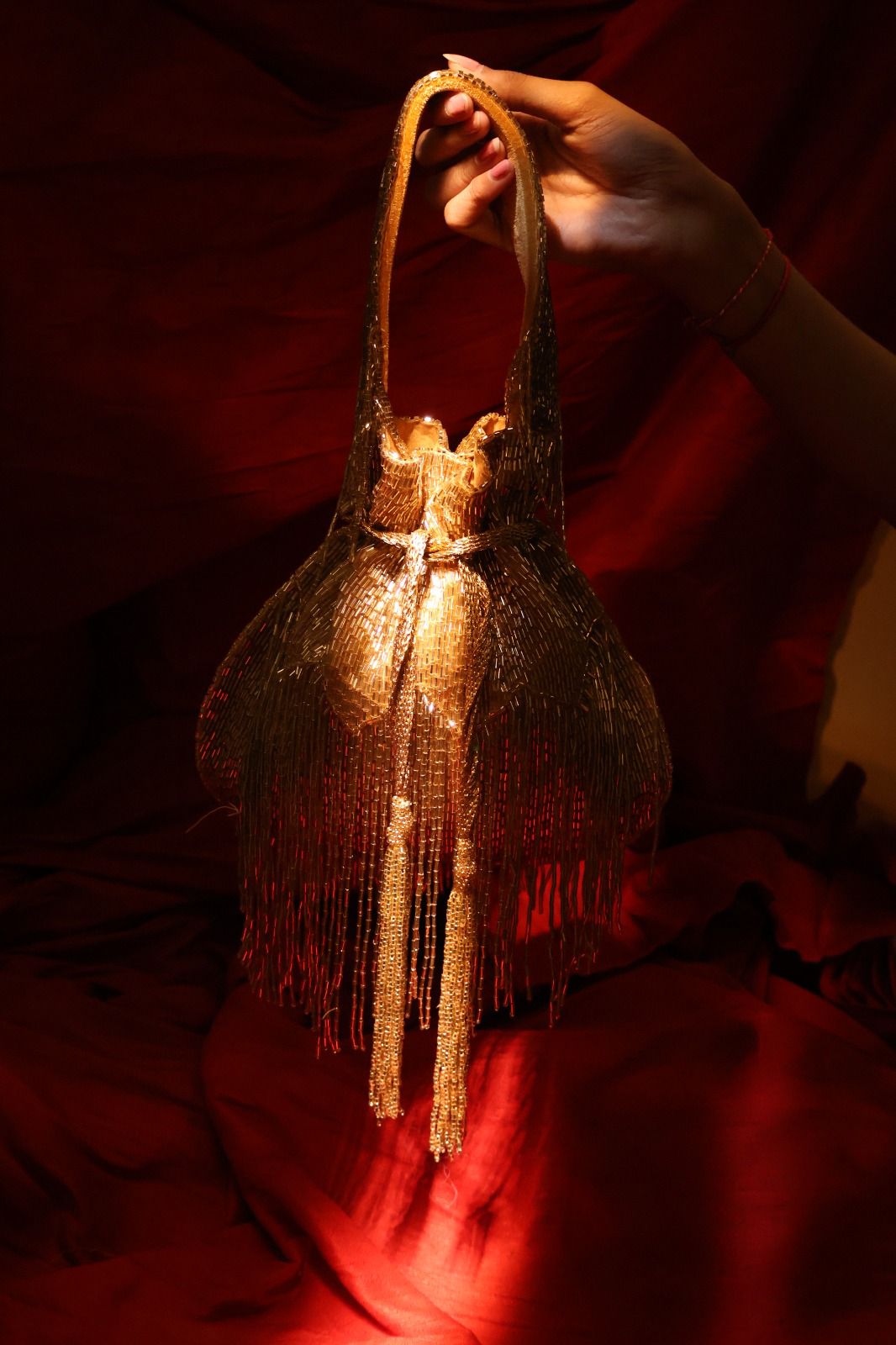 Gold layer Tassel potli