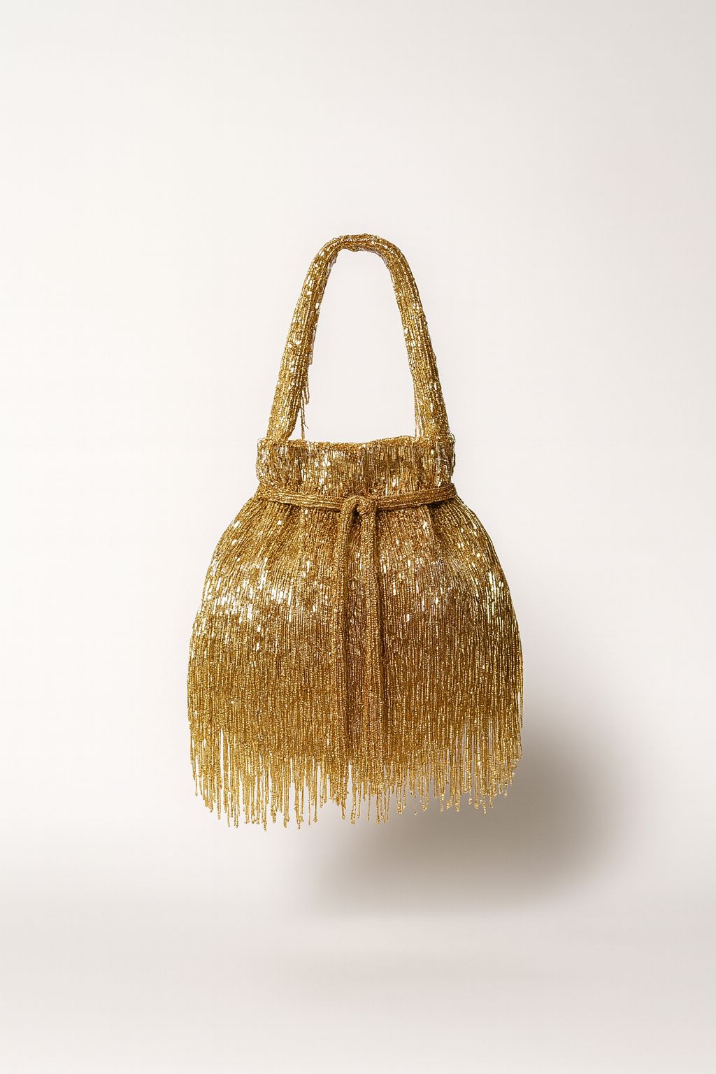 Gold layer Tassel potli