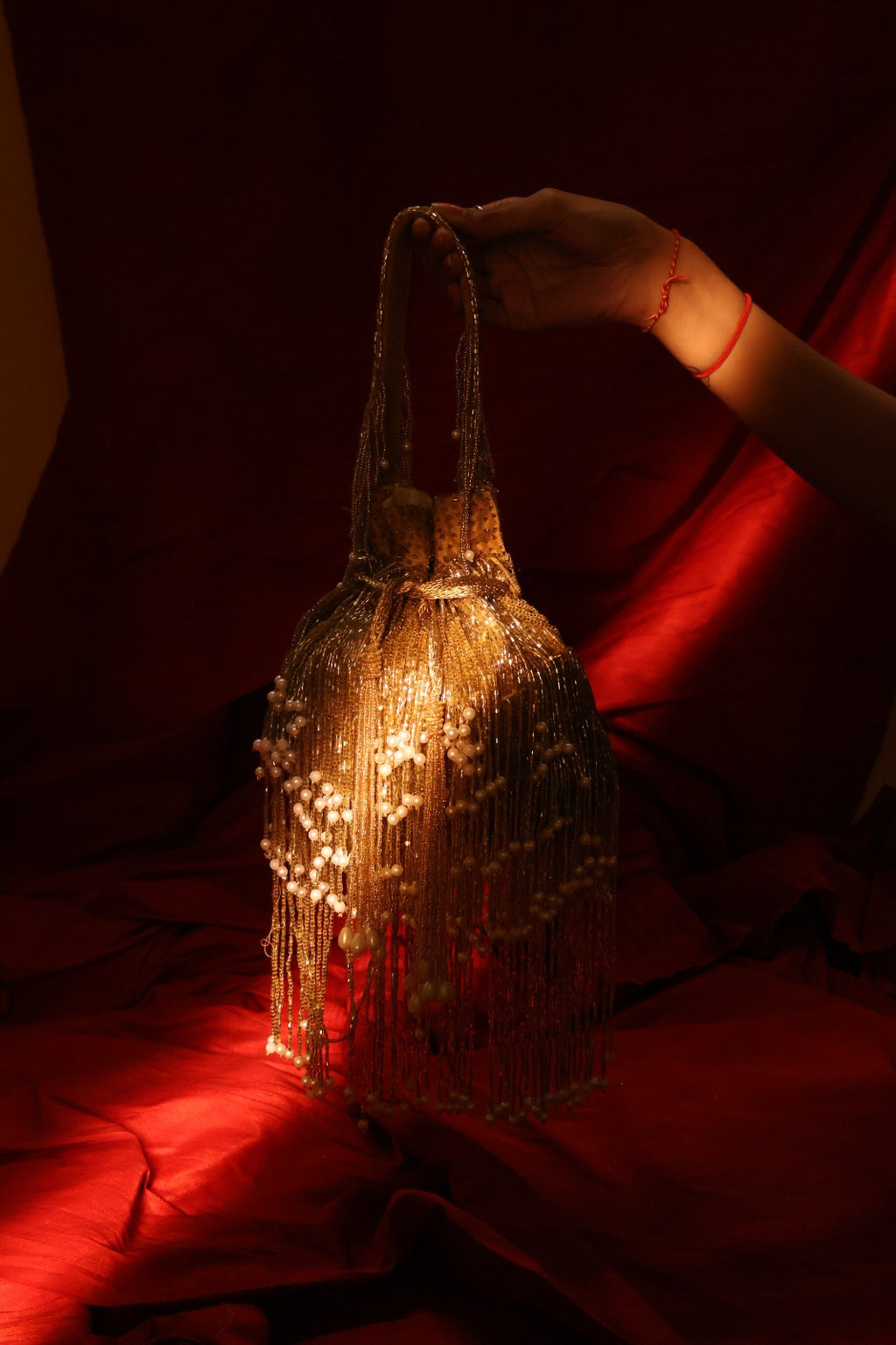 Embellishe tassle potil