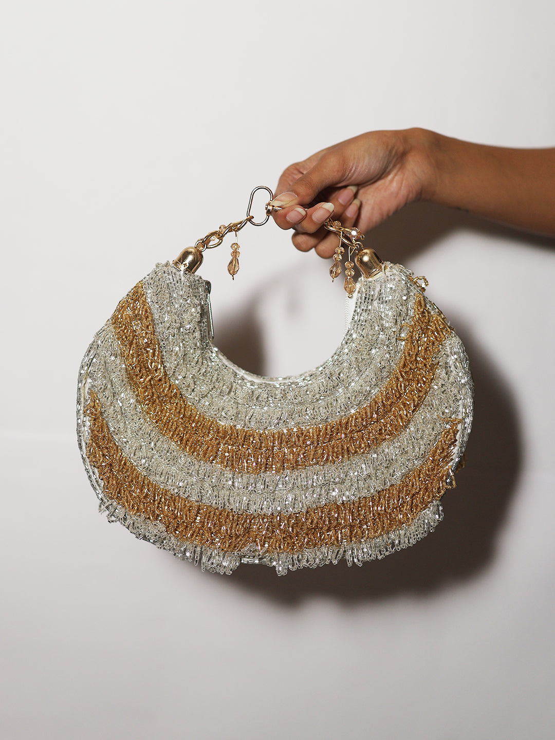 Gold silver Chandrama clutch