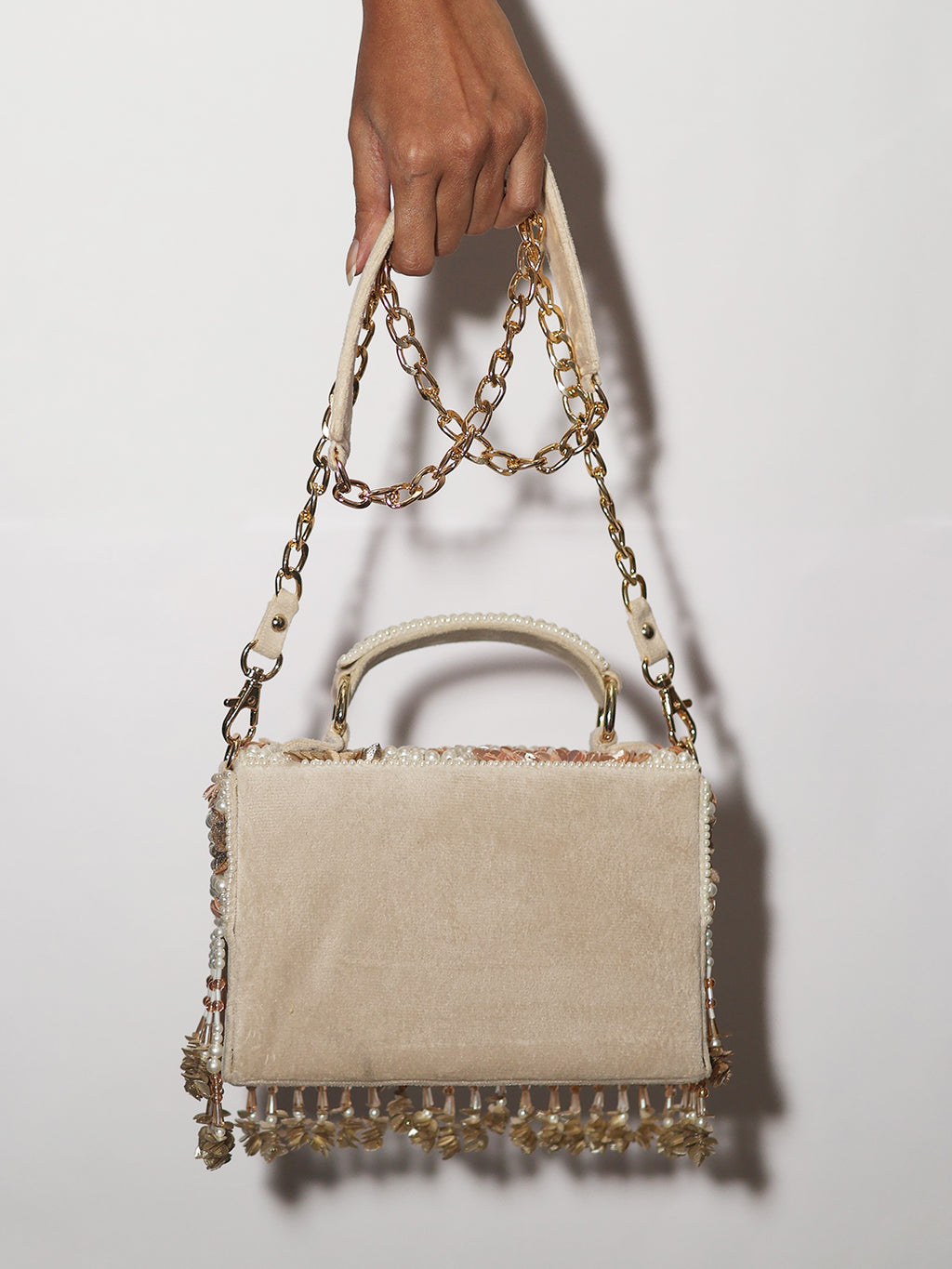 Peach rose gold clutch