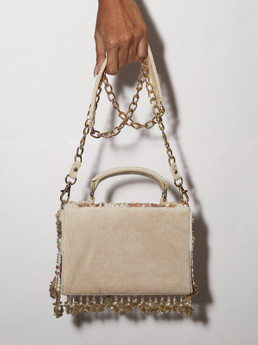 Peach rose gold clutch