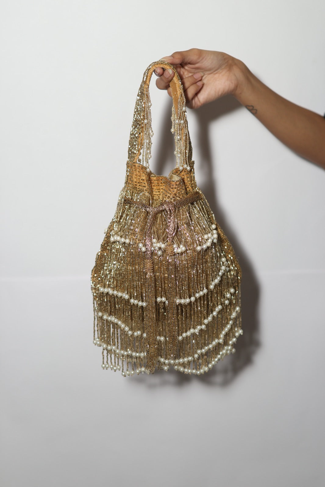 Embellishe tassle potil
