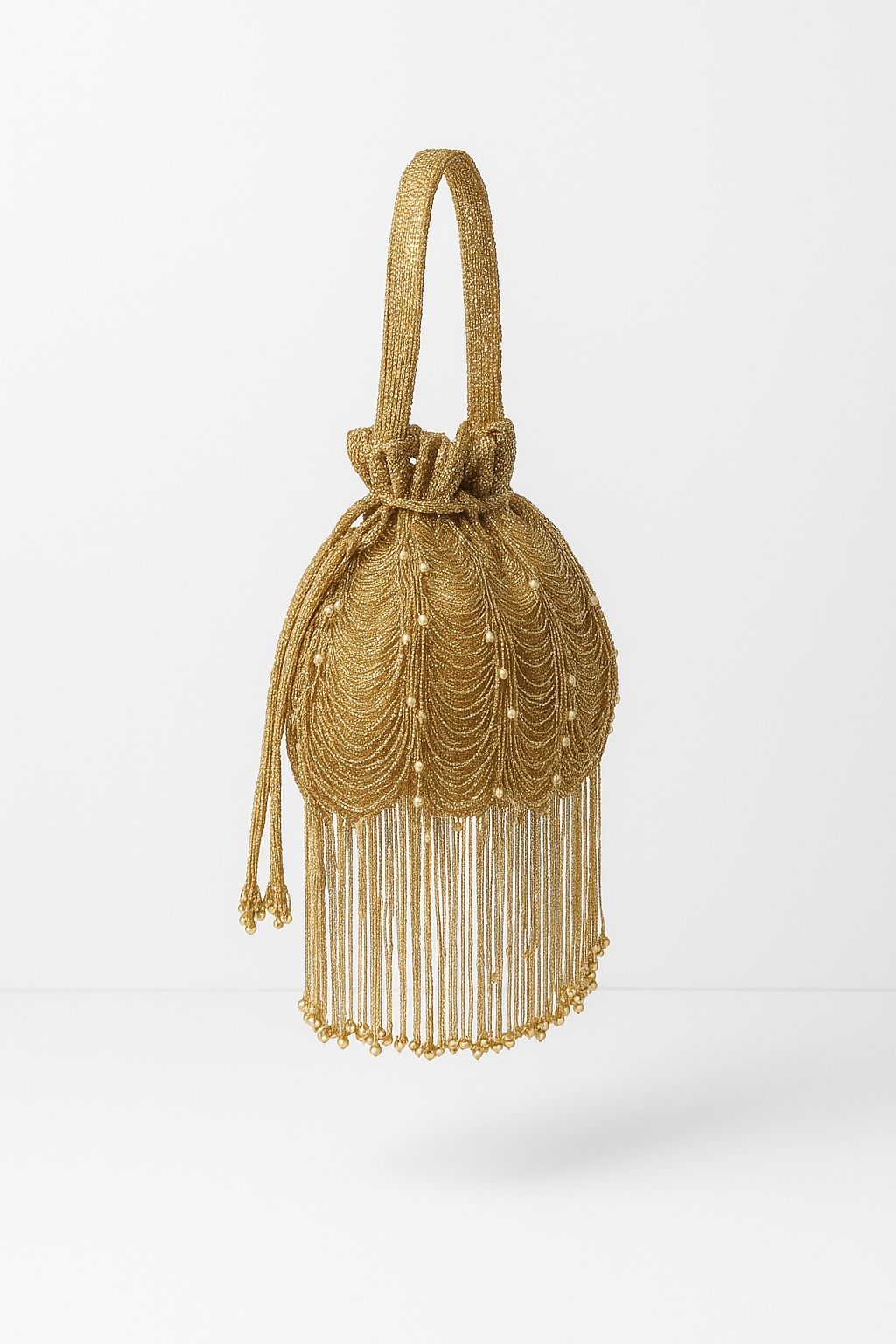 Gold fringe potli