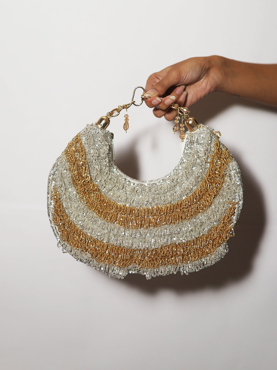 Gold silver Chandrama clutch