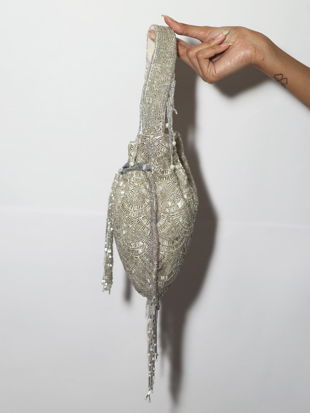 Umbrella tassel potli