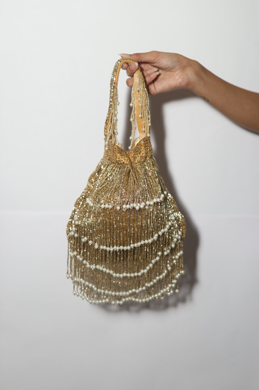 Embellishe tassle potil