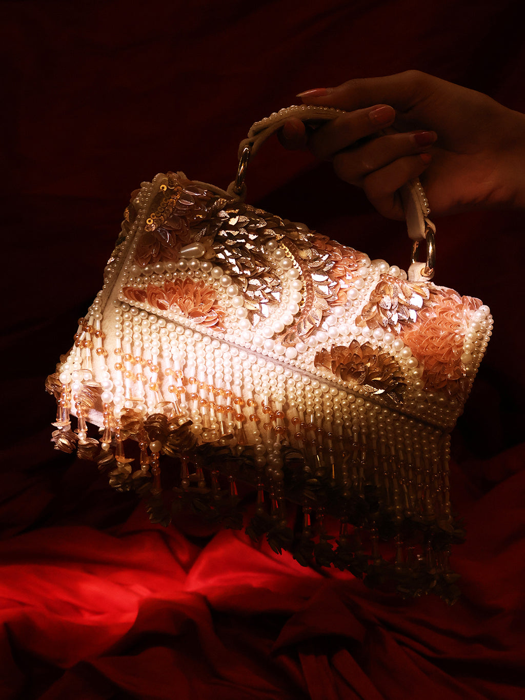 Peach rose gold clutch