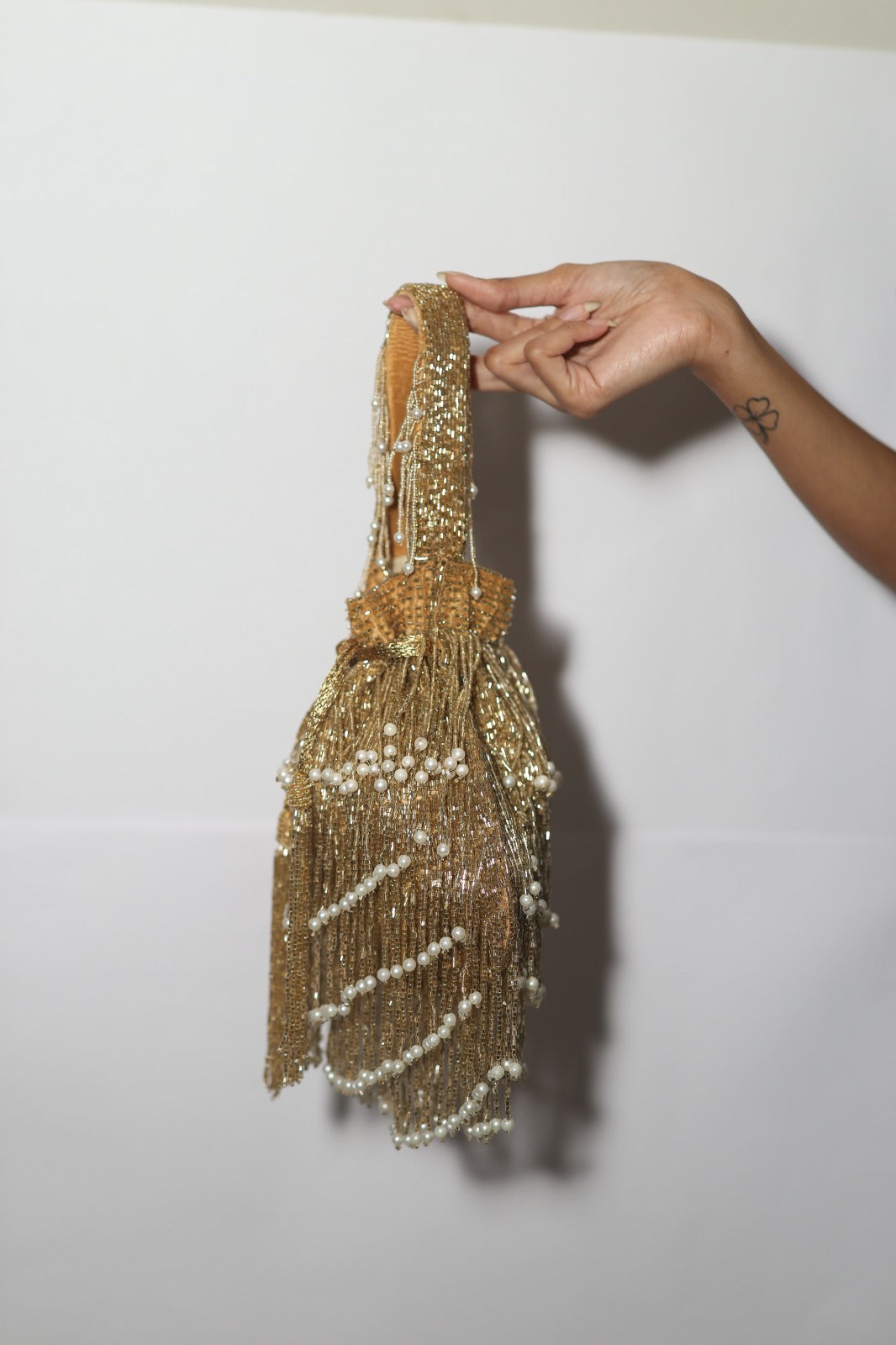 Embellishe tassle potil