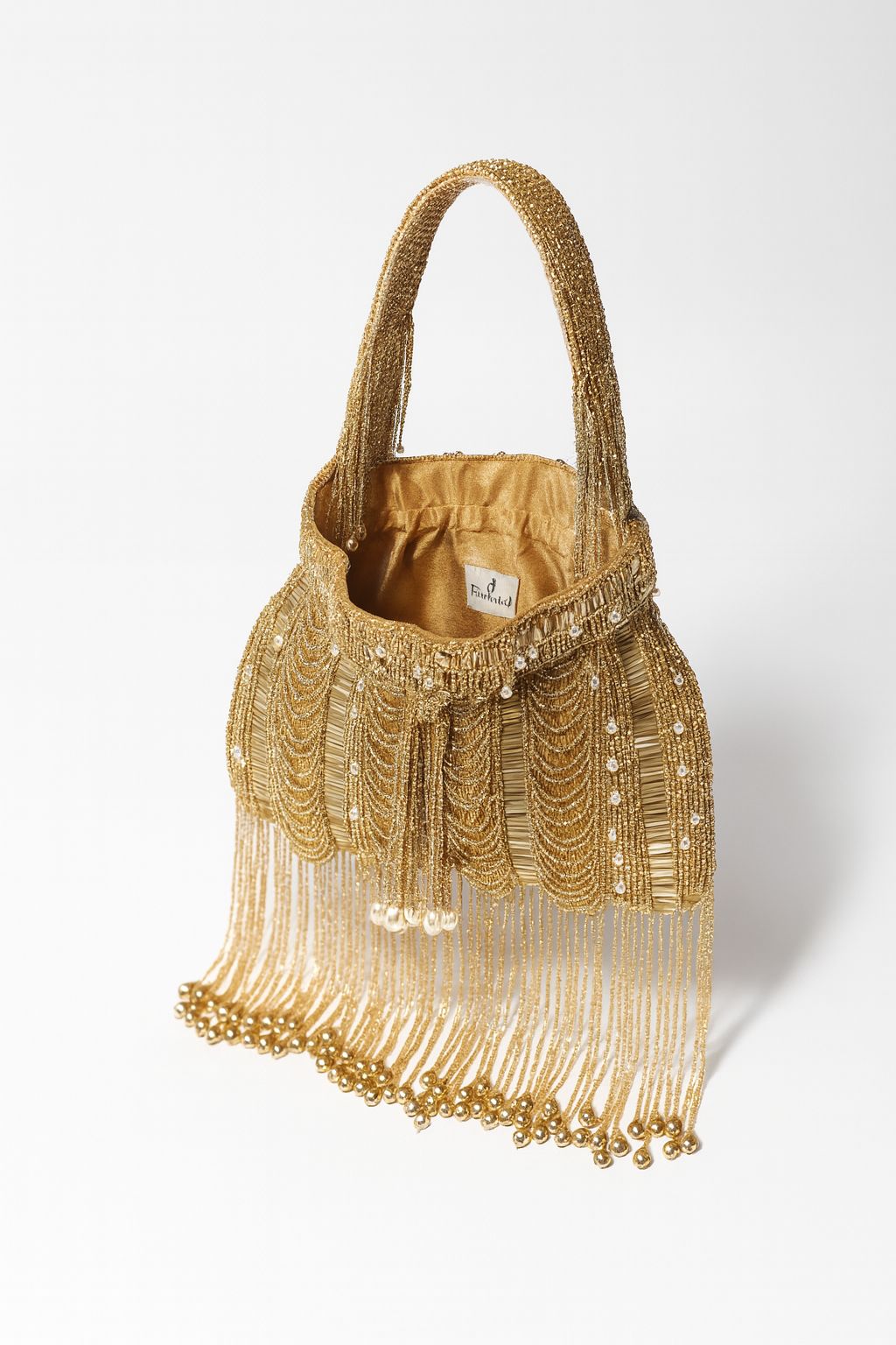 Gold fringe potli