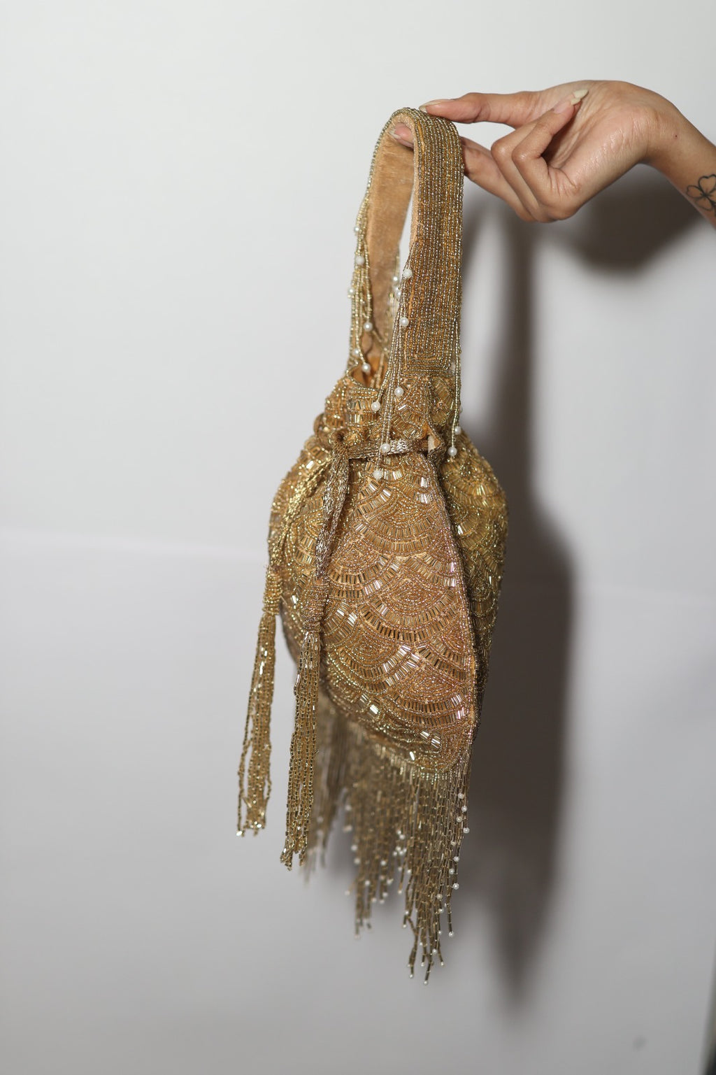 Drawstring Beaded Potil