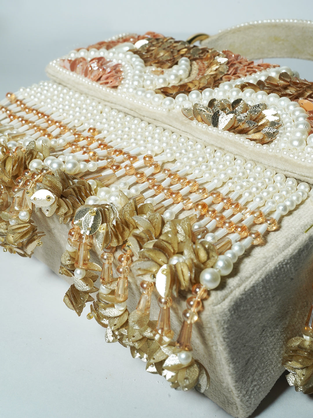 Peach rose gold clutch