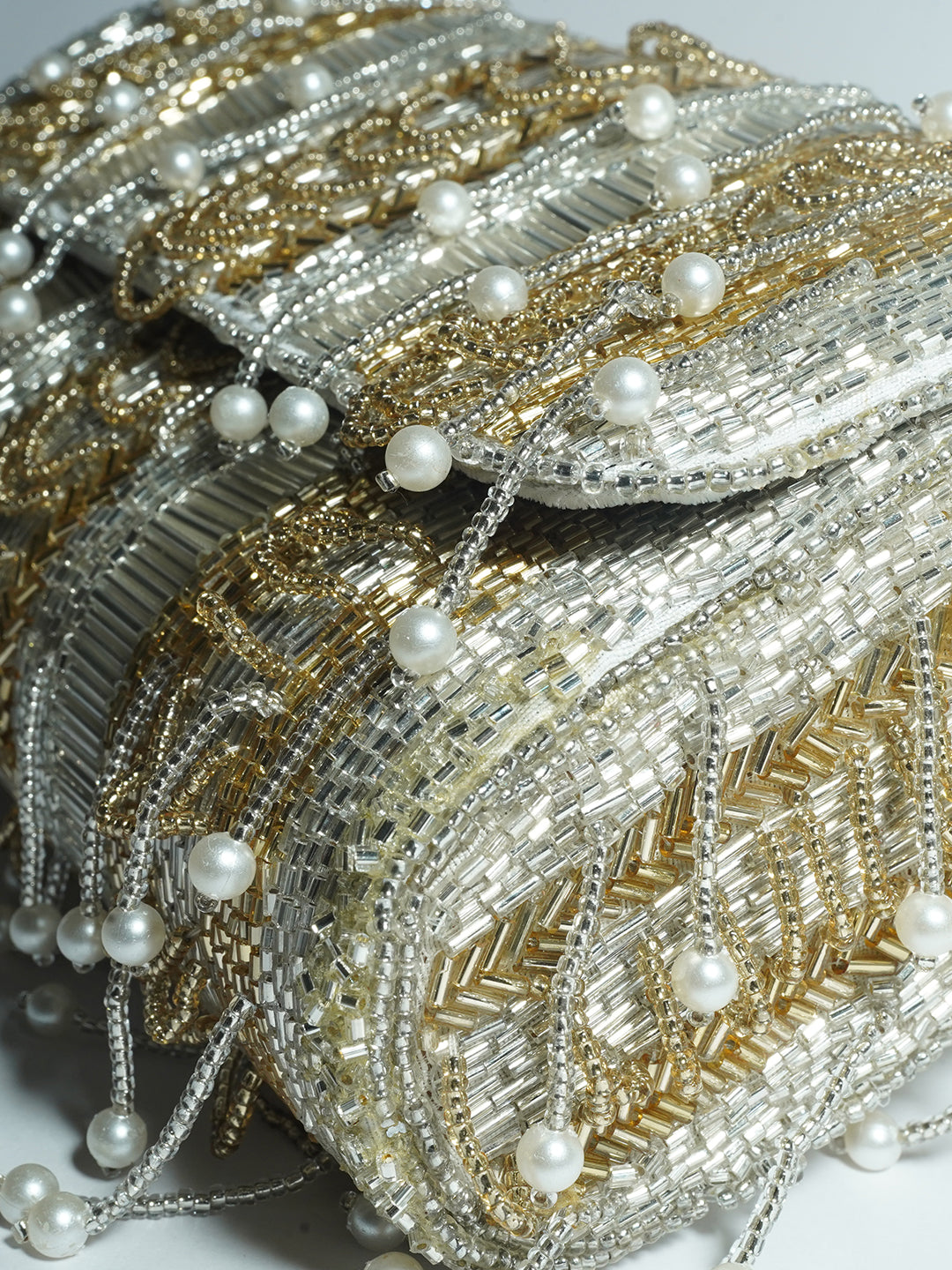 Minara silver gold clutch