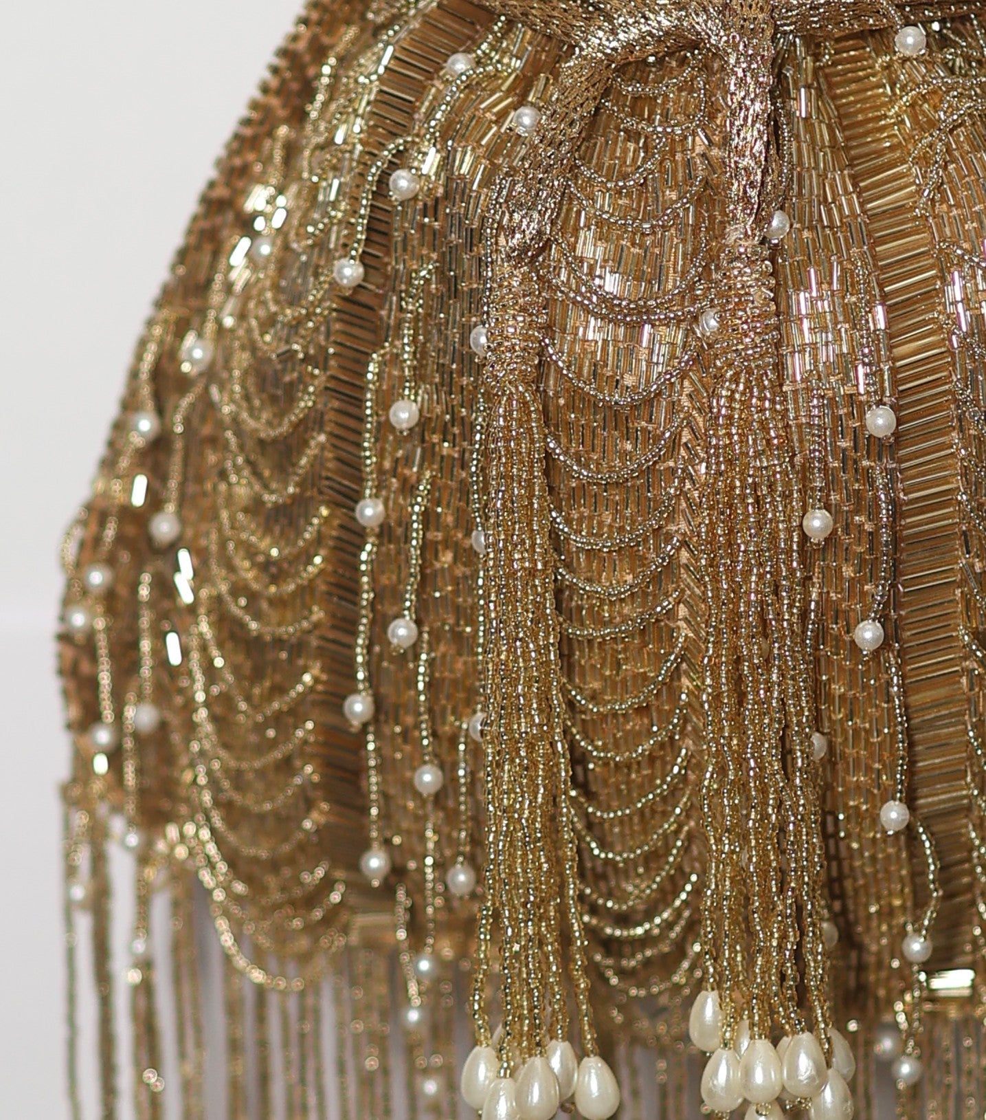 Gold fringe potli