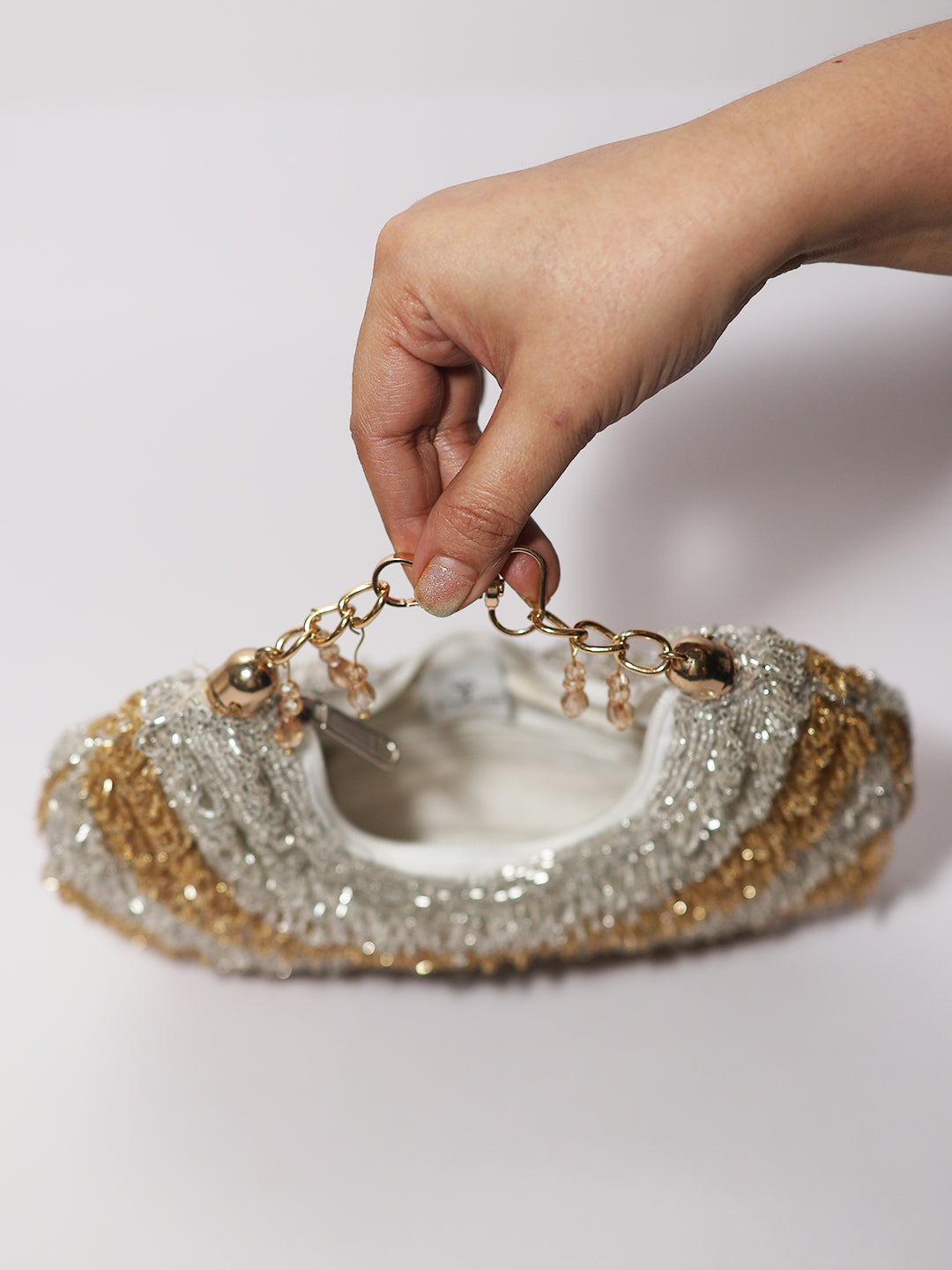 Gold silver Chandrama clutch