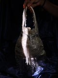 Umbrella tassel potli