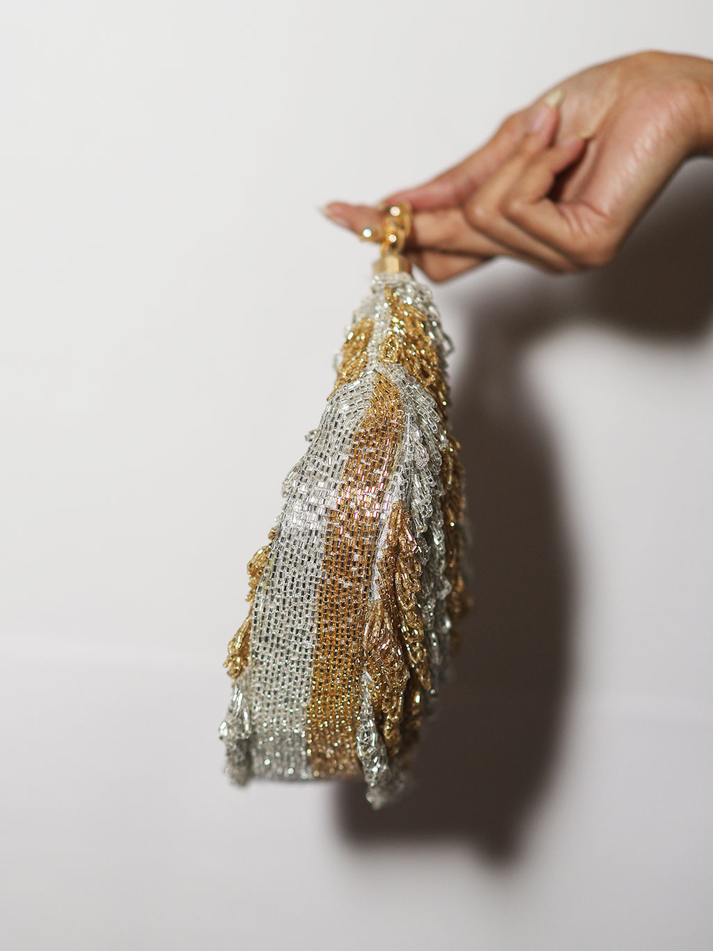 Gold silver Chandrama clutch