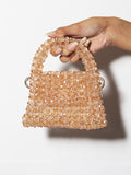 Gold mini sling bag