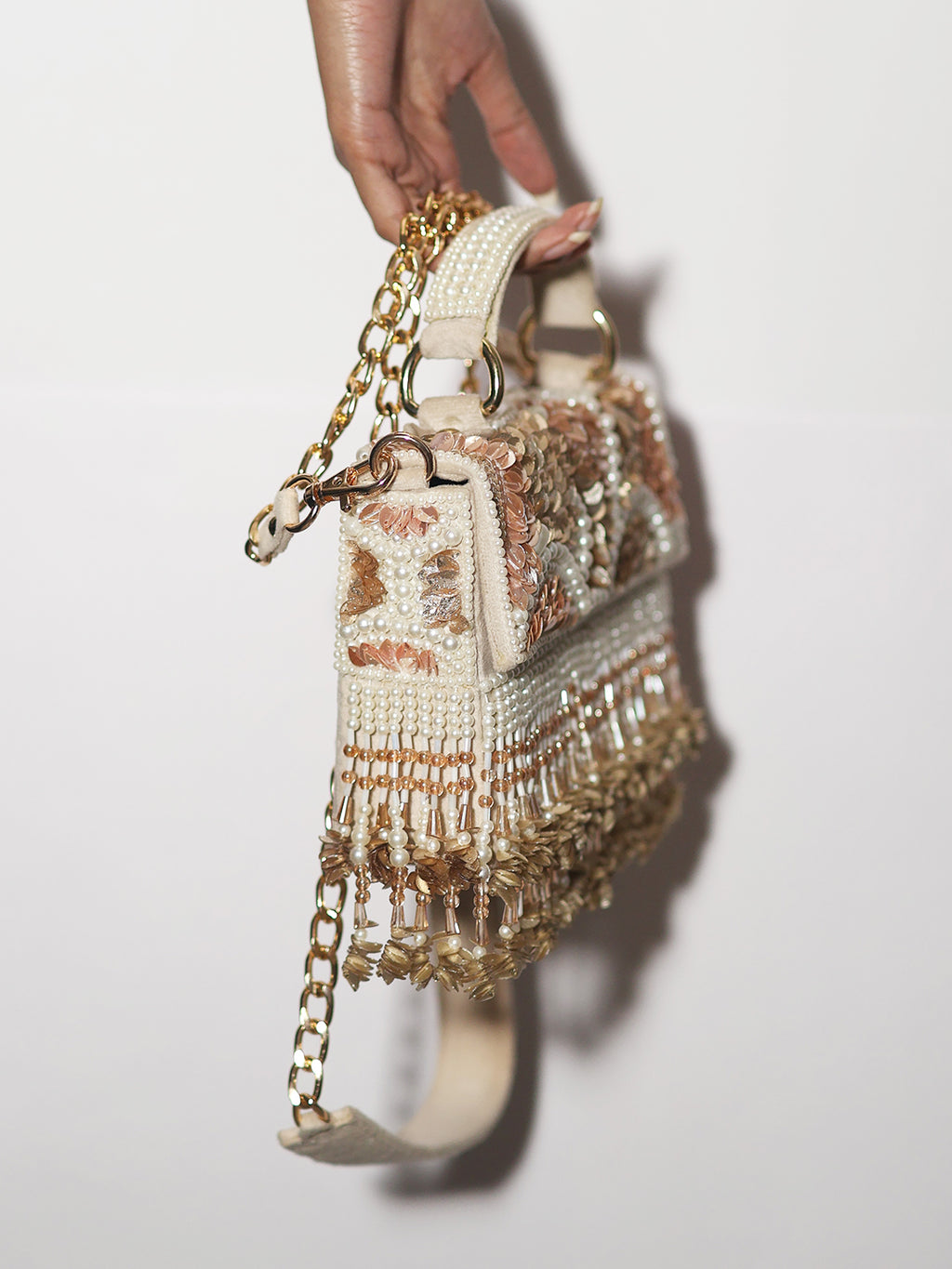 Peach rose gold clutch