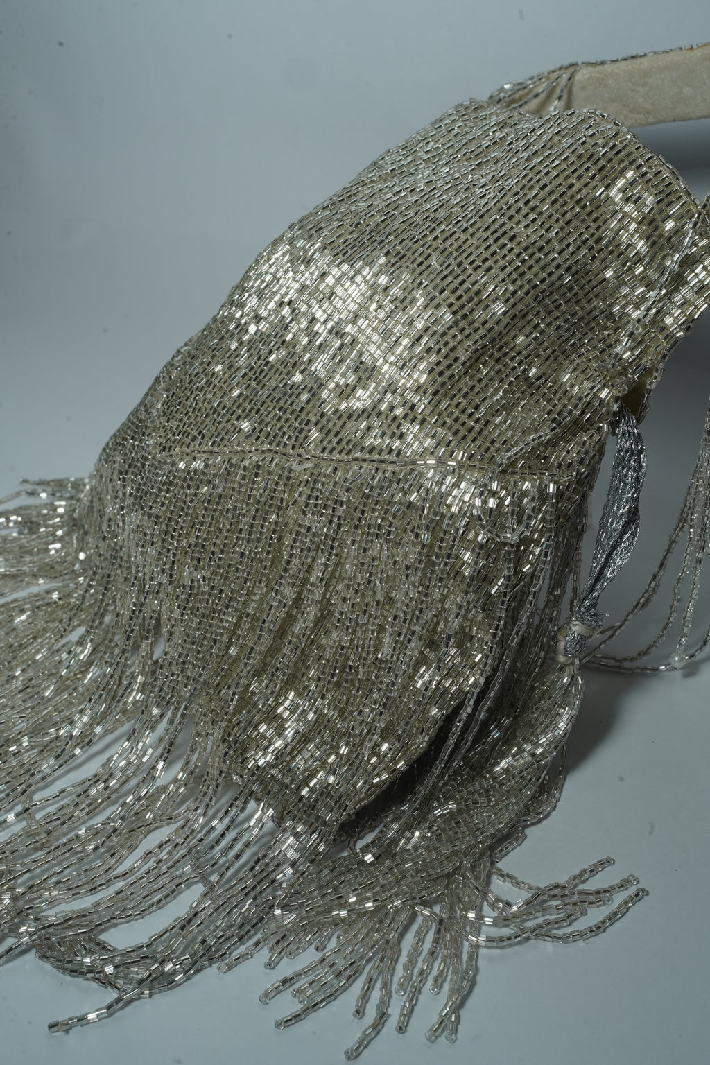 Silver long tassel potli bag