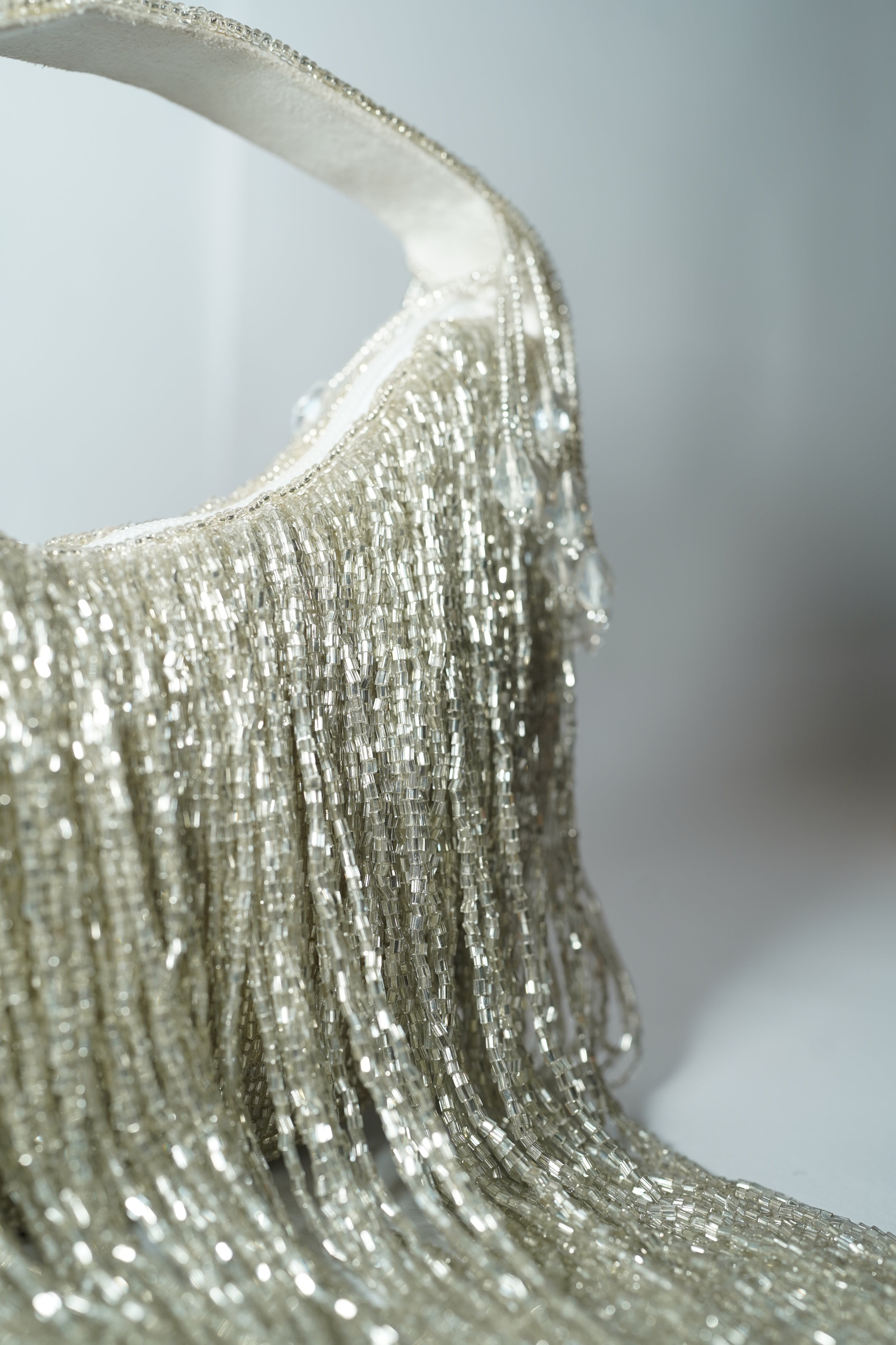 Mokn silver long tassel evening clutch