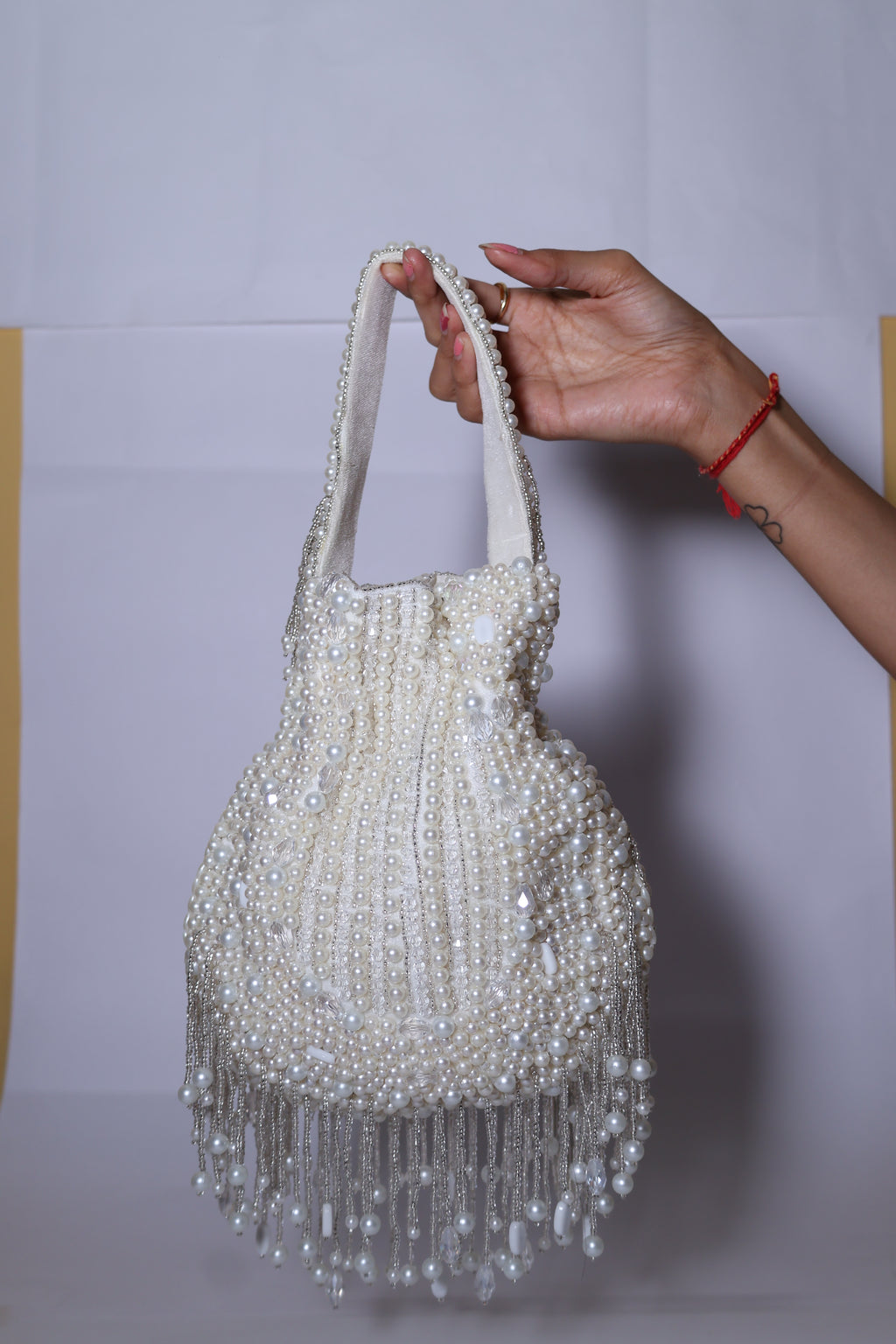 Ivory Peral Potil Bag