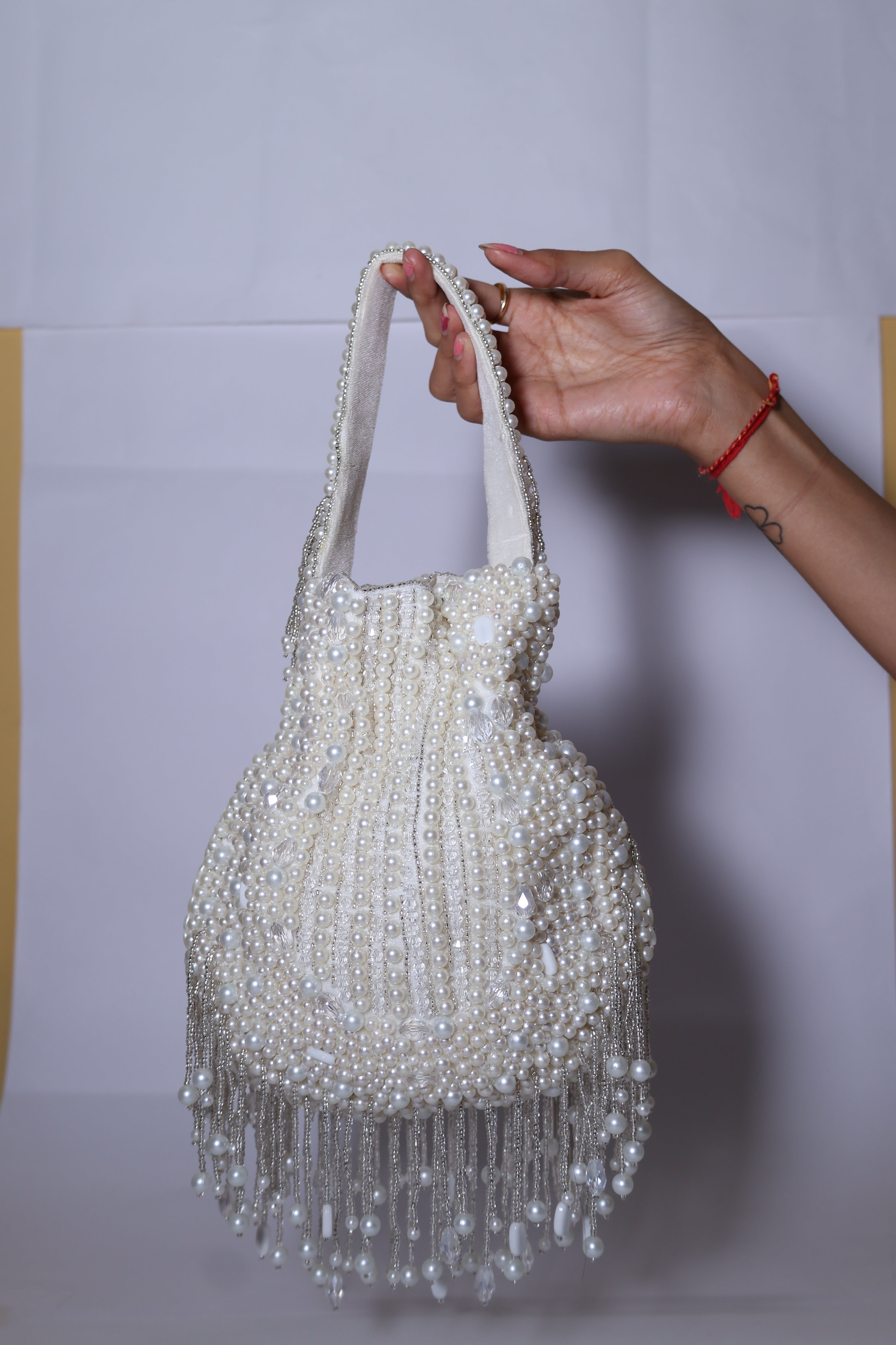 Ivory Peral Potil Bag