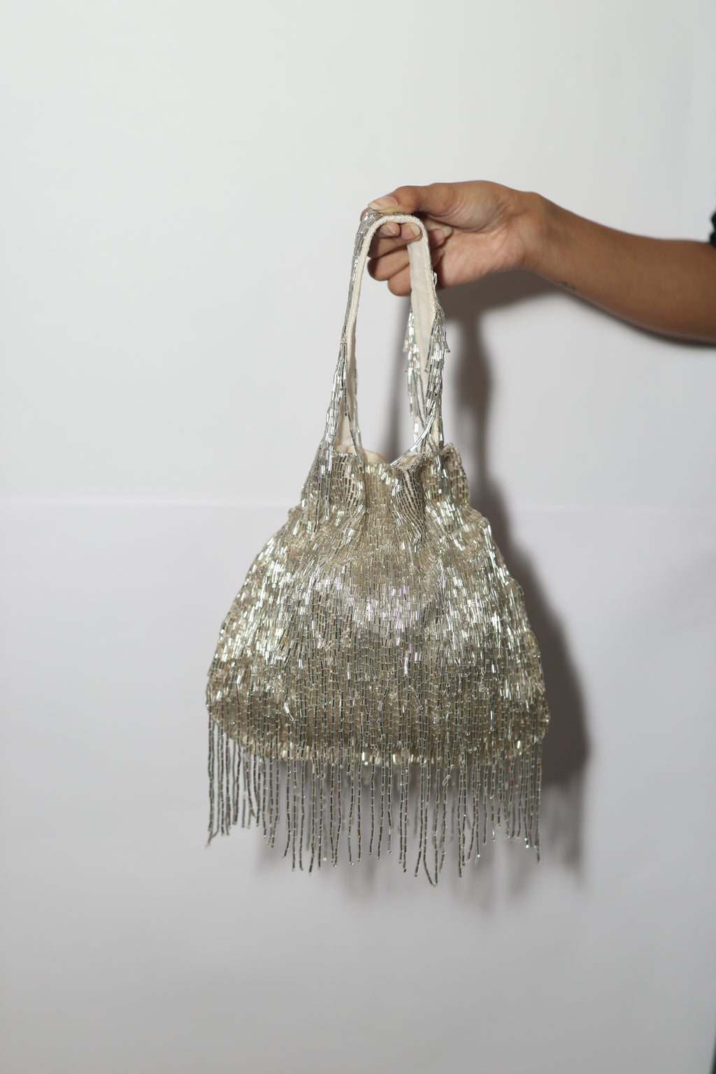 Silver long tassel potli bag