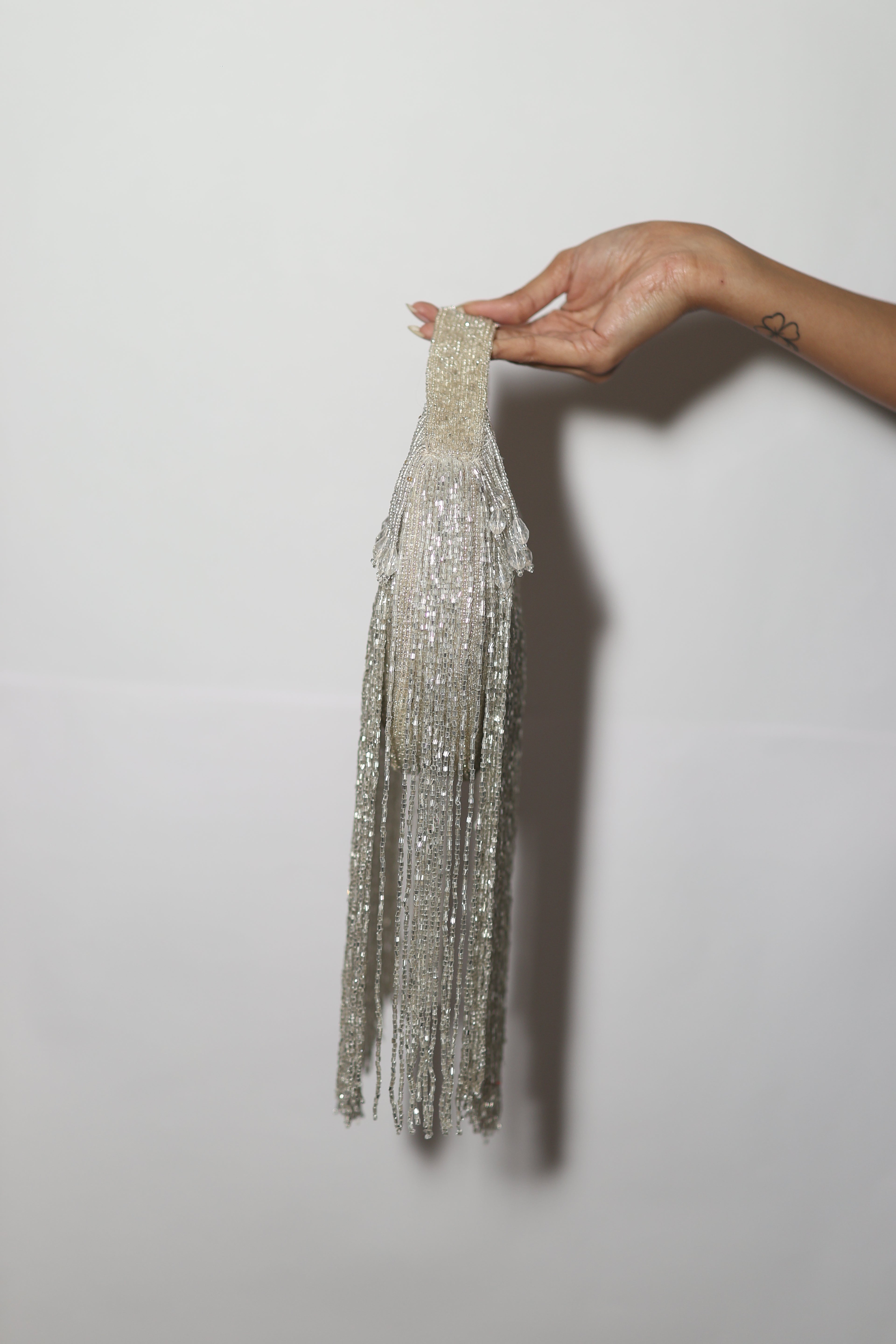 Mokn silver long tassel evening clutch