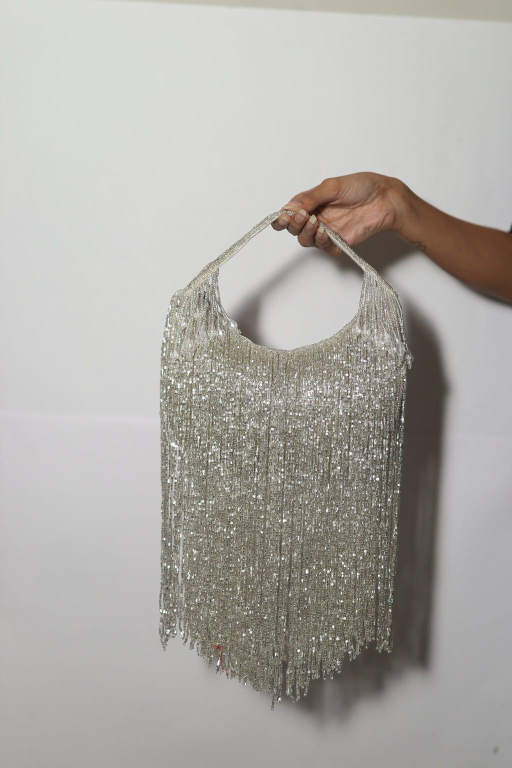 Mokn silver long tassel evening clutch
