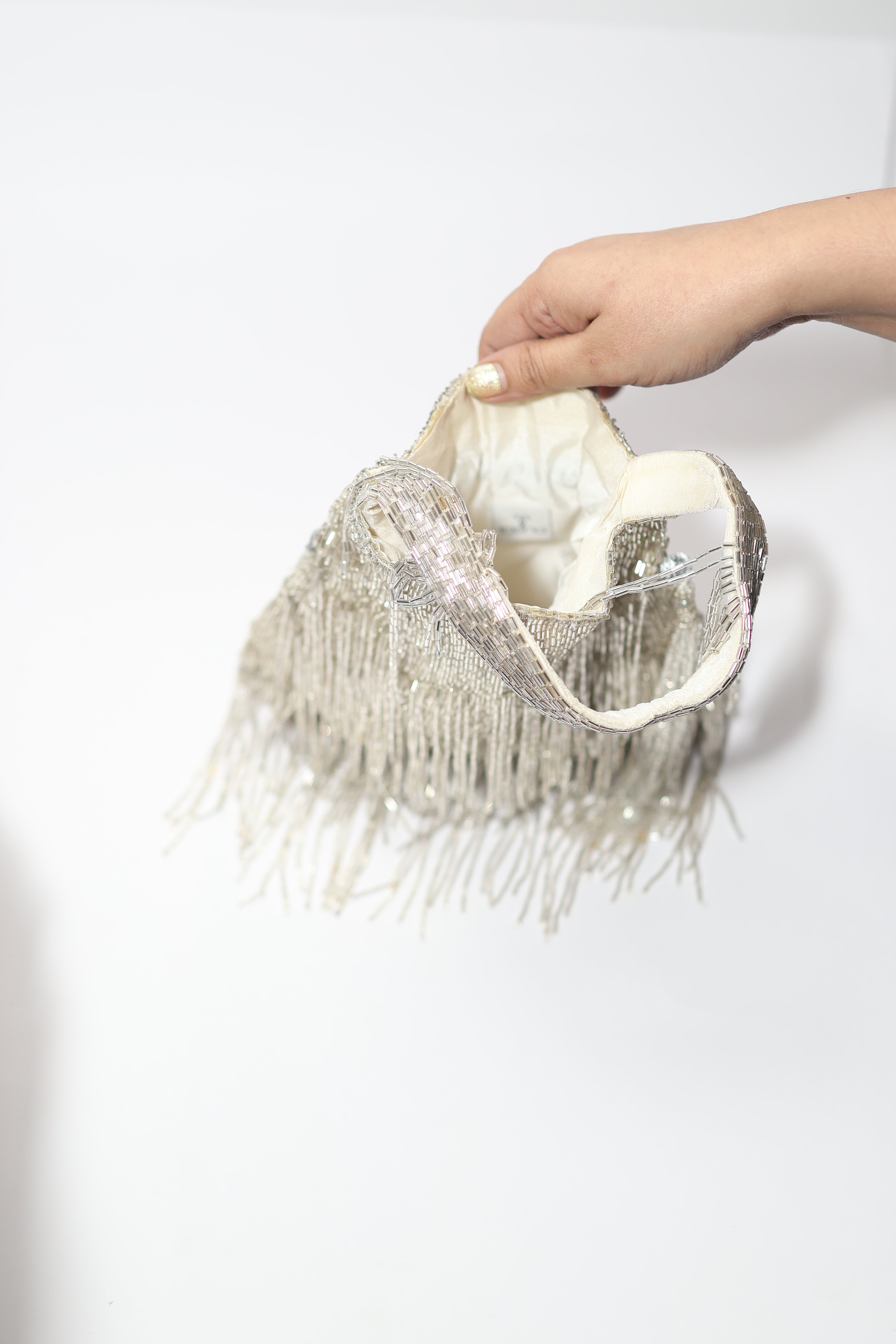 Silver long tassel potli bag