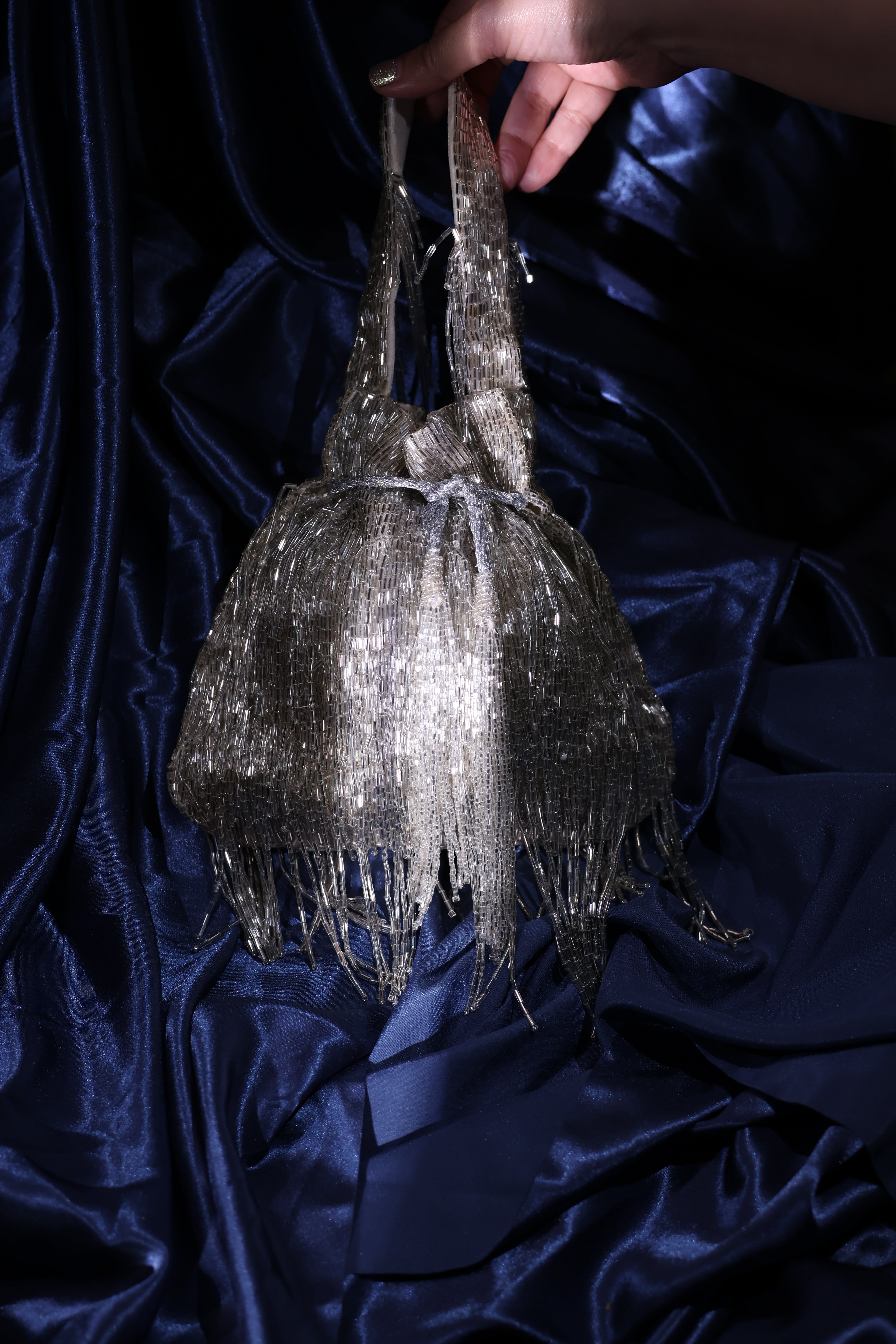 Silver long tassel potli bag